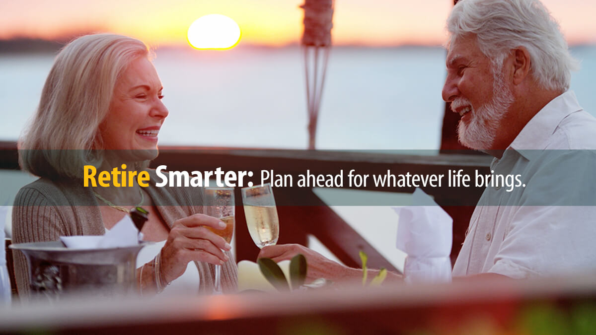 Retired couple with drinks at sunset can relax by managing their funds well during retirement.